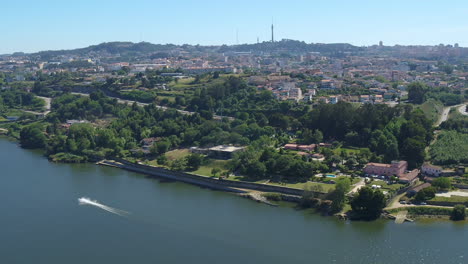 Aerial-view-from-Douro-river-with-a-jet-skier-in-Porto