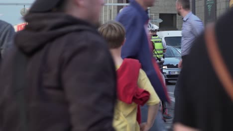 Police-car-and-officers-are-blocking-road-after-massive-demonstration-in-Prague,-Czech-Republic