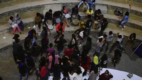 College-students-dancing-in-a-group-in-an-amphitheater