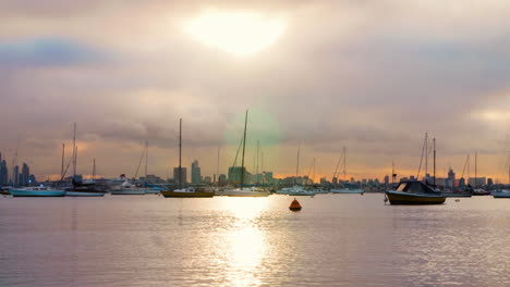 Hole-in-the-clouds-reveals-gorgeous-golden-hour-over-the-city-by-the-water