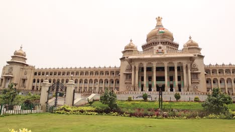 Pan-dolly-shot-of-Vidhana-Soudha-or-parliament-or-legislative-assembly-of-Karnataka-at-Bangalore,-India