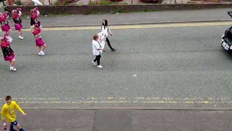 Radcliffe-community-parade-marching-through-streets