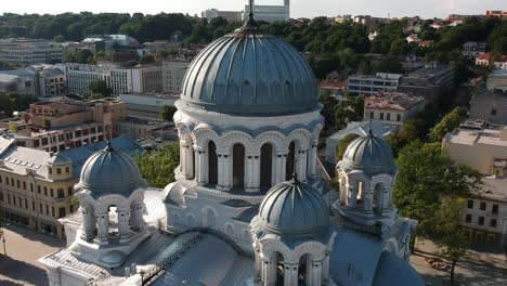 Aerial-shot-around-main-dome-of-Saint-Michael-church-in-Kaunas,-LIthuania