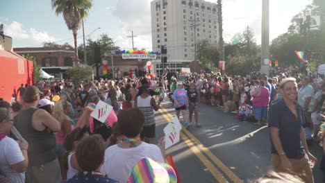People-Marching-in-Street-at-River-City-Pride-Parade-in-Sunny-Jacksonville,-FL