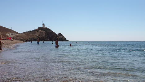 Tourists-At-Cala-Del-Corralete,-Cabo-De-Gata,-Almeria