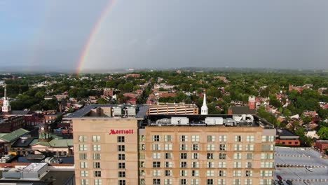 Lancaster,-Pennsylvania,-USA-in-summer-after-thunderstorm-and-rainbow,-aerial-view