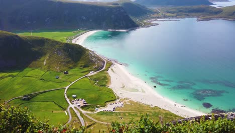 View-from-mountain-Mannen-over-Haukland-beach-in-Lofoten,-Norway-during-a-sunny-summer-day