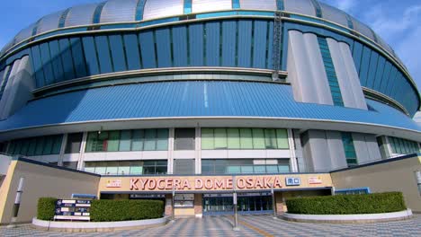 Imposing-entrance-of-iconic-landmark-Kyocera-Dome-Osaka-in-Nishi-ku,-Japan