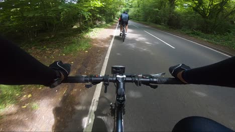 POV-View-Cycling-On-Countryside-Road-Being-Overtaken-By-Passing-Traffic