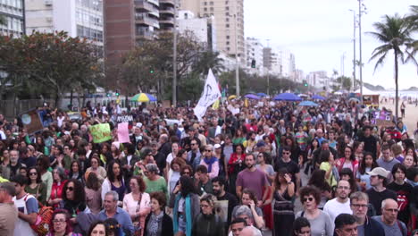 Large-crowd-demonstrates-in-Ipanema,-Rio-de-Janeiro,-Brazil,-for-the-protection-of-the-Amazon-forest