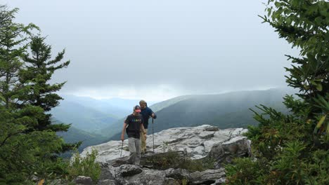 Three-male-hikers-depart-from-the-Rohrbaugh-Cliffs-in-the-Dolly-Sods-Wilderness,-part-of-the-Monongahela-National-Forest-in-West-Virginia