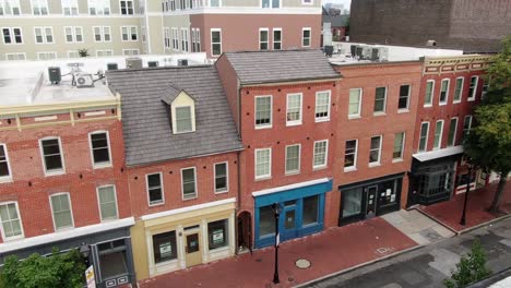 Vacant-storefront-stores-for-lease-in-historic-colonial-Fells-Point-neighborhood,-coronavirus-COVID-19-impacts-tourism-and-retail-industries