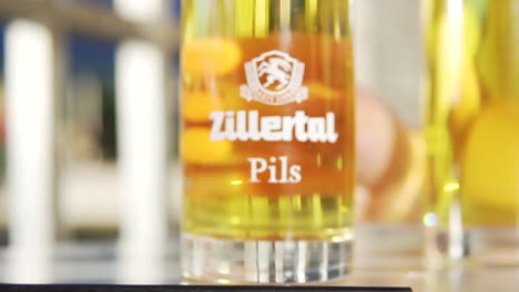 Slow-Motion-of-Golden-and-Draught-Zillertal-Tap-Beer-called-Pils