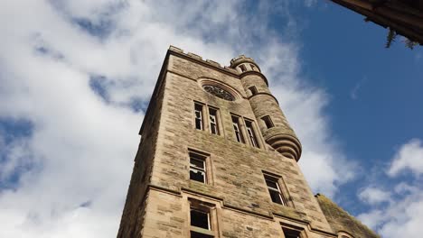 Slow-motion-close-up-of-one-of-the-clock-towers-at-Hartwood-Hospital