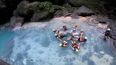 Group-of-people-make-a-star-or-circle-into-water-and-having-fun