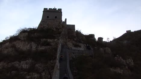 Tourists-visiting-Watchtower-of-the-Great-Wall-of-China,-Juyong-Pass-section