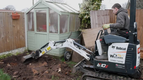 Man-Using-A-Micro-Digger,-Landscape-Gardening-Project