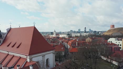 AERIAL:-Pedestal-Drone-Shot-of-Oldtown-with-Vilnius-Gediminas-Tower