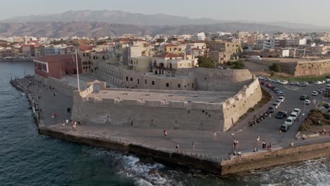 Chania-city-fortification-and-cityscape-view-in-aerial-drone-shot