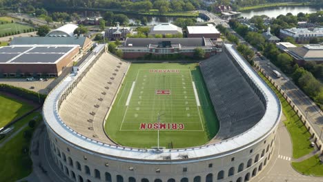 Aerial-Establishing-Shot-of-Harvard-University-Football-Stadium-and-Cambridge,-MA