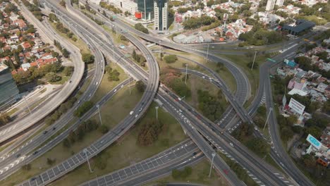 Aerial-of-Panamericana-highway-and-General-Paz-avenue-junction-with-traffic-at-daytime