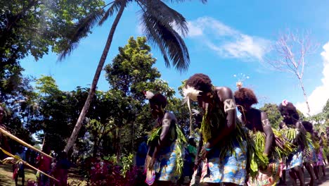 A-traditional-colourful-tribal-sing-sing,-bamboo-and-dance-performance-at-cultural-festival-show-in-Bougainville,-Papua-New-Guinea