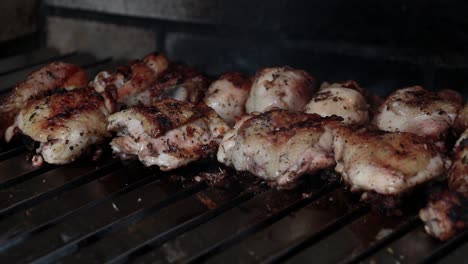 Chicken-Legs-and-Breast-pieces-on-a-BBQ-Flame-Grill