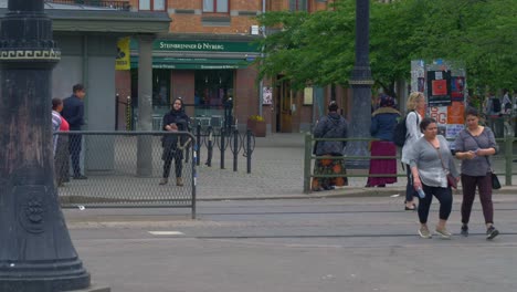 People-Crossing-the-Street-in-the-Shopping-Town-of-Gothenburg-with-Tourists-Crossing-the-Road