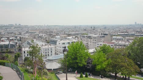 Panoramic-view,-aerial-skyline-of-Paris-on-city-center,-churches-and-cathedrals,-architecture,-roofs-of-houses,-streets-landscape,-Paris,-France