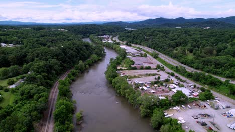Flying-along-the-french-broad-river-in-asheville-nc,-asheville-North-Carolina
