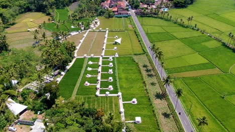 Aerial-view-on-popular-selfie-spot-on-rice-plantation-Svargabumi,-Java-Indonesia