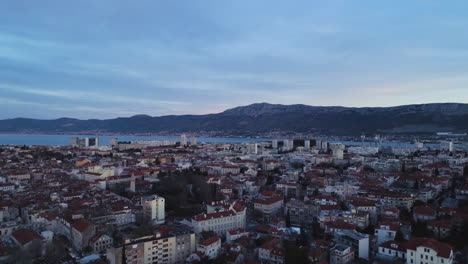 Majestic-cityscape-of-Split-town-in-Croatia,-aerial-ascend-shot