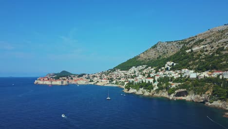 Aerial-shot-of-the-Adriatic-Sea-and-Dubrovnik-coast-on-a-summer-day,-Croatia