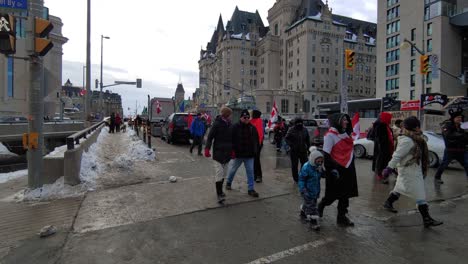 Freedom-Convoy-protesters-march-through-Ottawa,-Ontario,-Canada