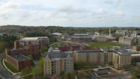 Aerial-Pedestal-Up-Reveals-Boston-College-Campus-in-Newtown,-Massachusetts