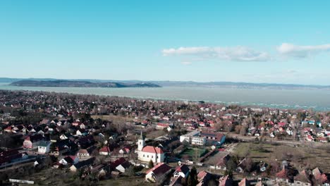 Aerial-view-of-city-of-Balafon-and-Lake-Balaton,-Hungary