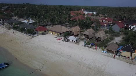 Great-aerial-view-flight-Flying-over-deserted-secret-sandy-Mushroom-beach-with-nice-local-Huts