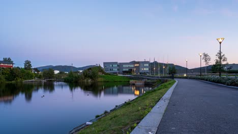 Sunset-to-night-transition-timelapse-on-waterside-walking-path-near-the-Framo-main-office-in-Florvag-Askoy