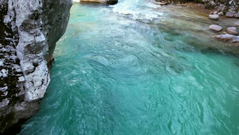 The-Soča-River-in-Slovenia,-part-of-the-Triglav-National-Park,-has-an-emerald-green-color,-and-is-one-of-the-most-beautiful-rivers-in-all-of-Europe