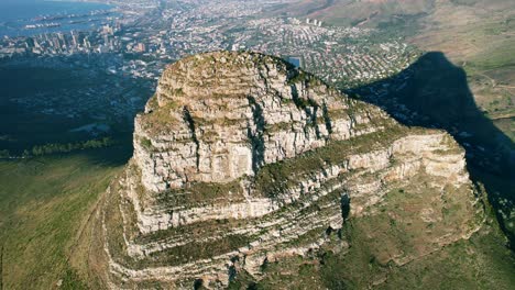 aerial-top-down-view-of-Lions-Head-peak-with-Cape-Town-in-background-at-sunset