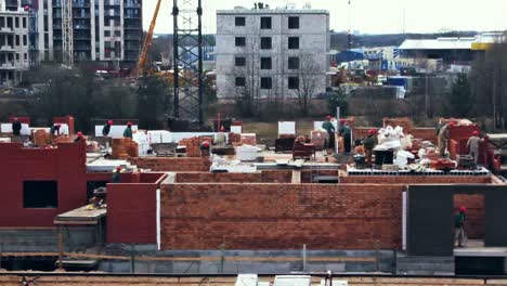 Close-Up-of-Builders-on-a-Building-Under-Construction