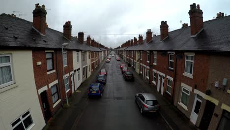 Aerial-footage-of-Oldfield-Street-in-one-of-Stoke-on-Trents-poorer-areas,-Terrace-housing,-poverty-and-urban-decline
