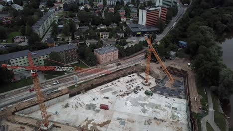 flying-over-construction-site-where-are-cranes