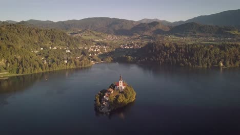 Aerial-view-of-Lake-Bled-with-row-boat-in-background