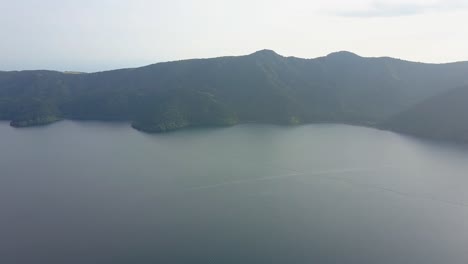 Aerial-view-of-over-lake-ashi-with-ship-panoroma