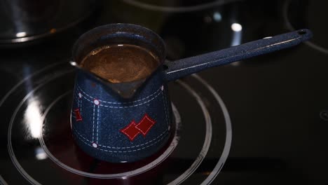 Brewing-Turkish-coffee-at-home,-close-up,-nobody