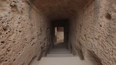 Travelling-down-the-stairs-to-the-Tomb-of-Kings-in-Paphos-Cyprus