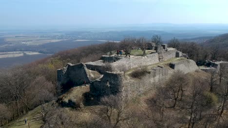 Aerial-view-of-the-Ruins-of-Drégelyvár-with-the-county's-villages-and-lands-in-the-background-at-Drégelypalánk,-Nógrád,-Hungary-at-spring