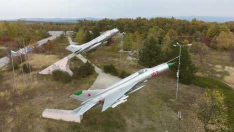 Aerial-footage-of-military-airplanes-outdoor-museum-exhibition