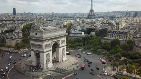 Reveal-Arc-de-Triumph-and-Eiffel-Tower,-low-drone-view,-Paris,-France